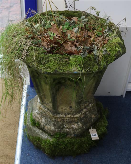 A Victorian weathered composition octagonal garden urn, on matching plinth, H.2ft 1in.